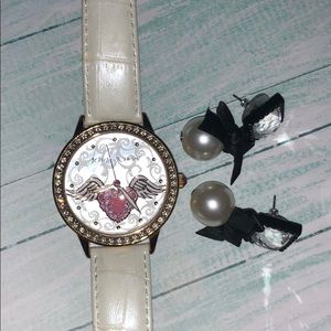 Betsy Johnson watch and earrings.